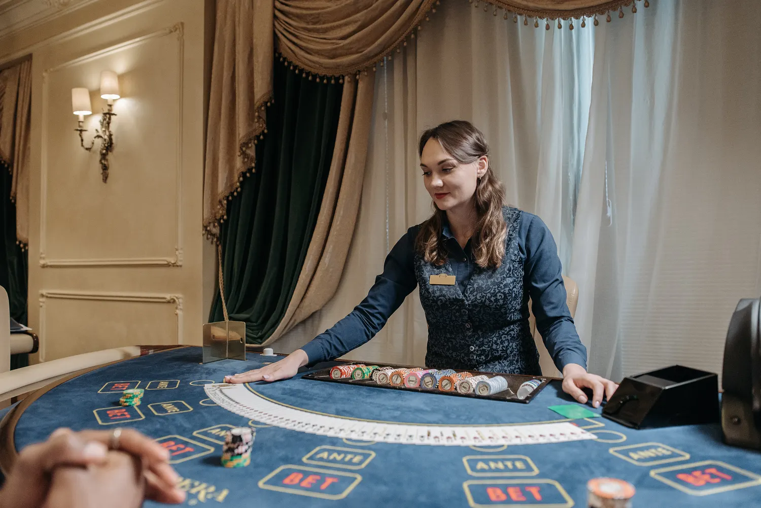 Croupier managing luxury clay chips